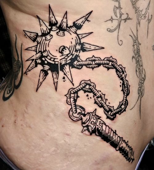 Bold blackwork tattoo detail